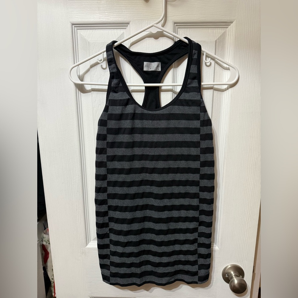 Athleta black and white striped workout top with built-in bra, size M